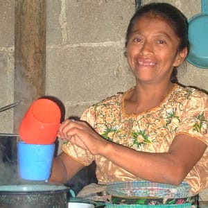 Woman cooking for student